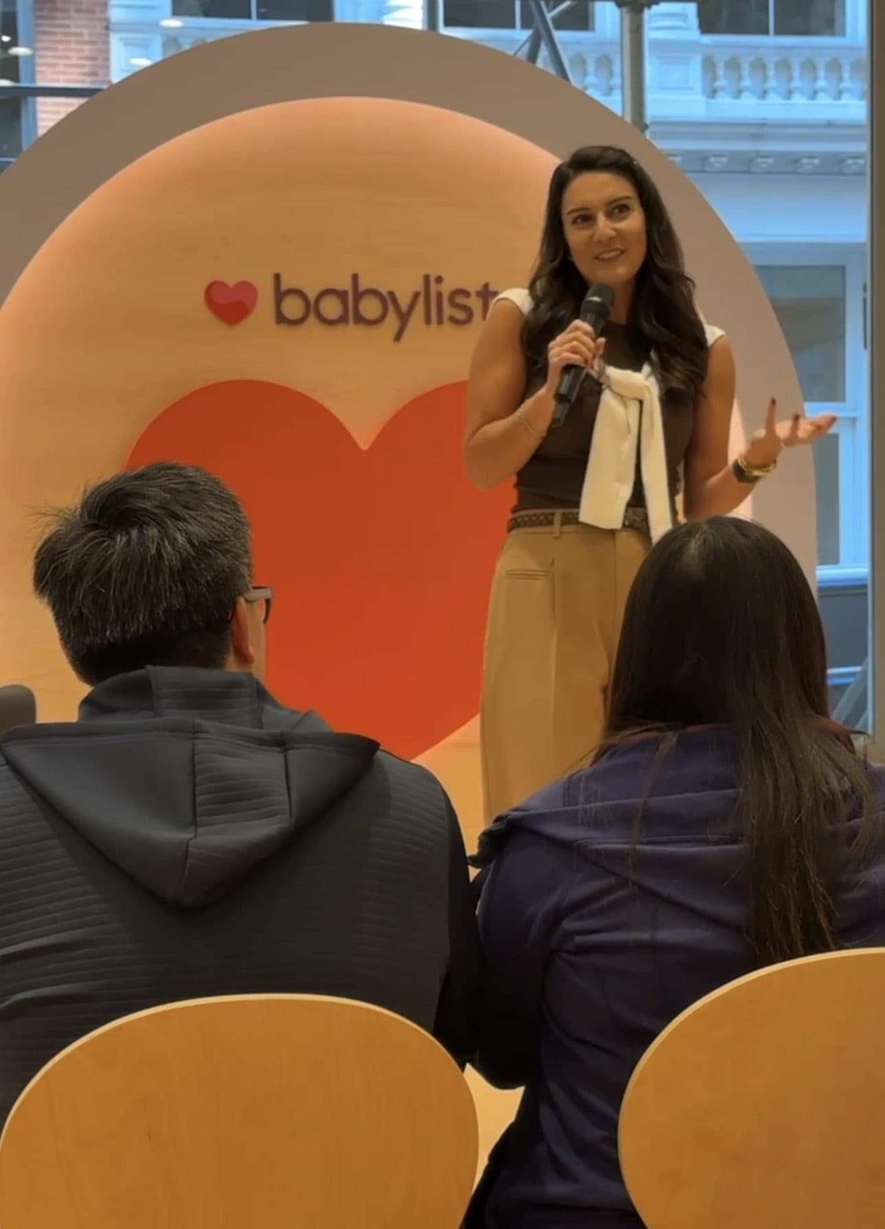 Lia Tuso speaking to parents at the Babylist showroom in New York City